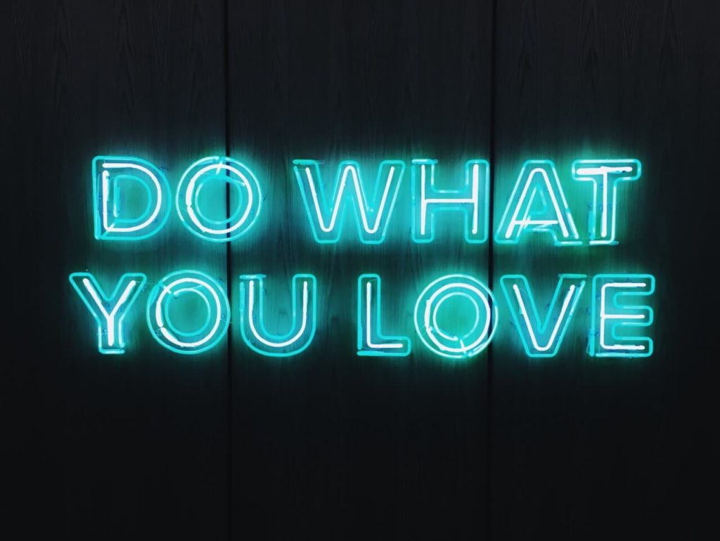 Sign created from neon lights reading "Do what you love"